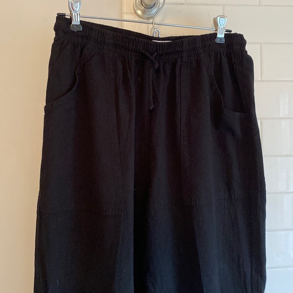 Black elastic drawstring pants. - Picture 1 of 5